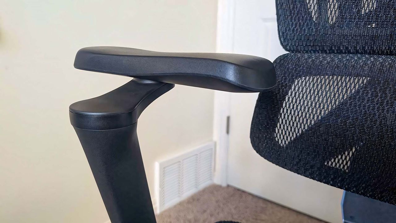 Closeup of a 5D armrest while it's rotated back and sideways.