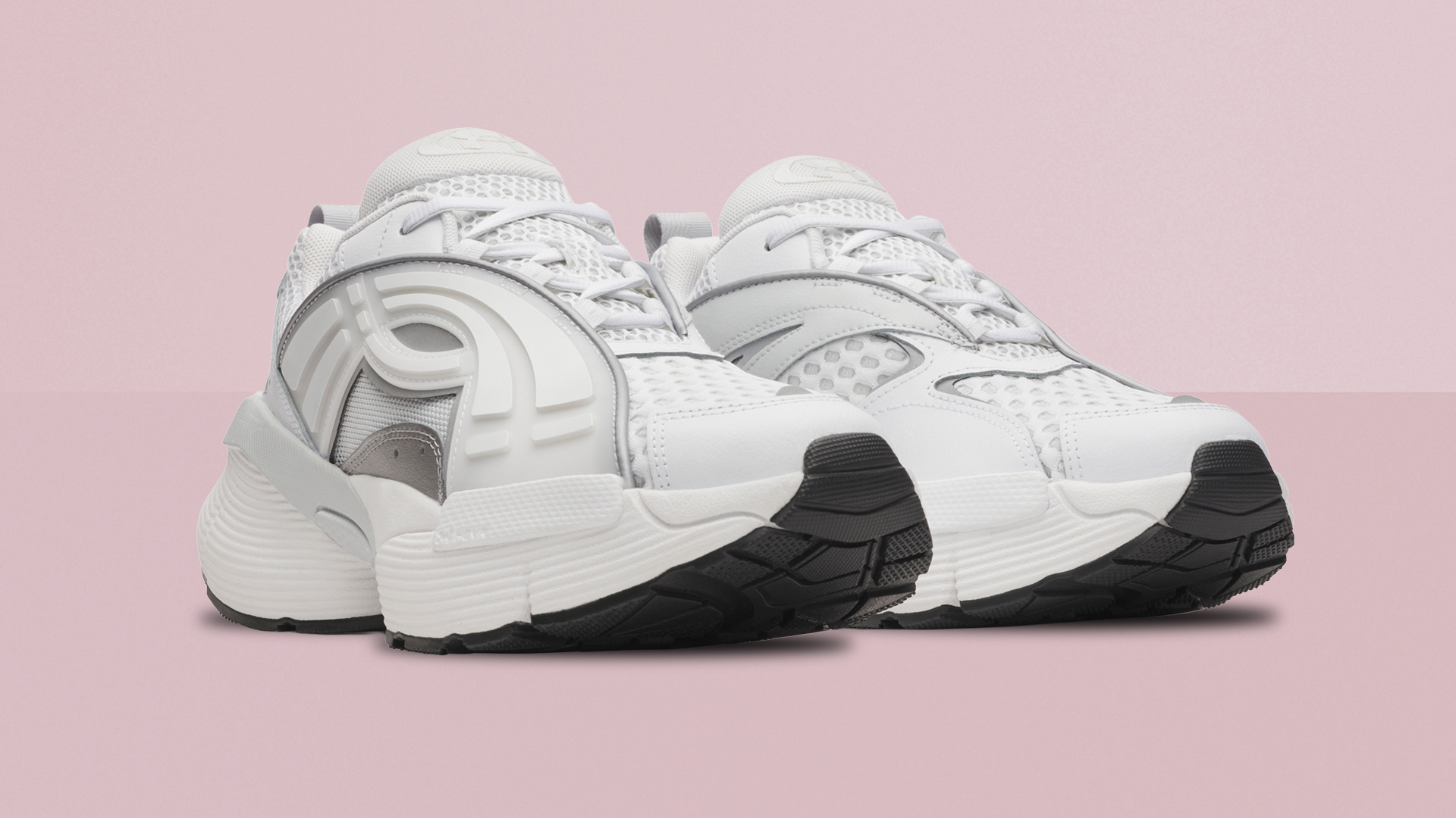 UA Arc 96 sneakers on colourful background