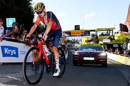 Tom Pidcock crosses the line at the 2023 Tour de France