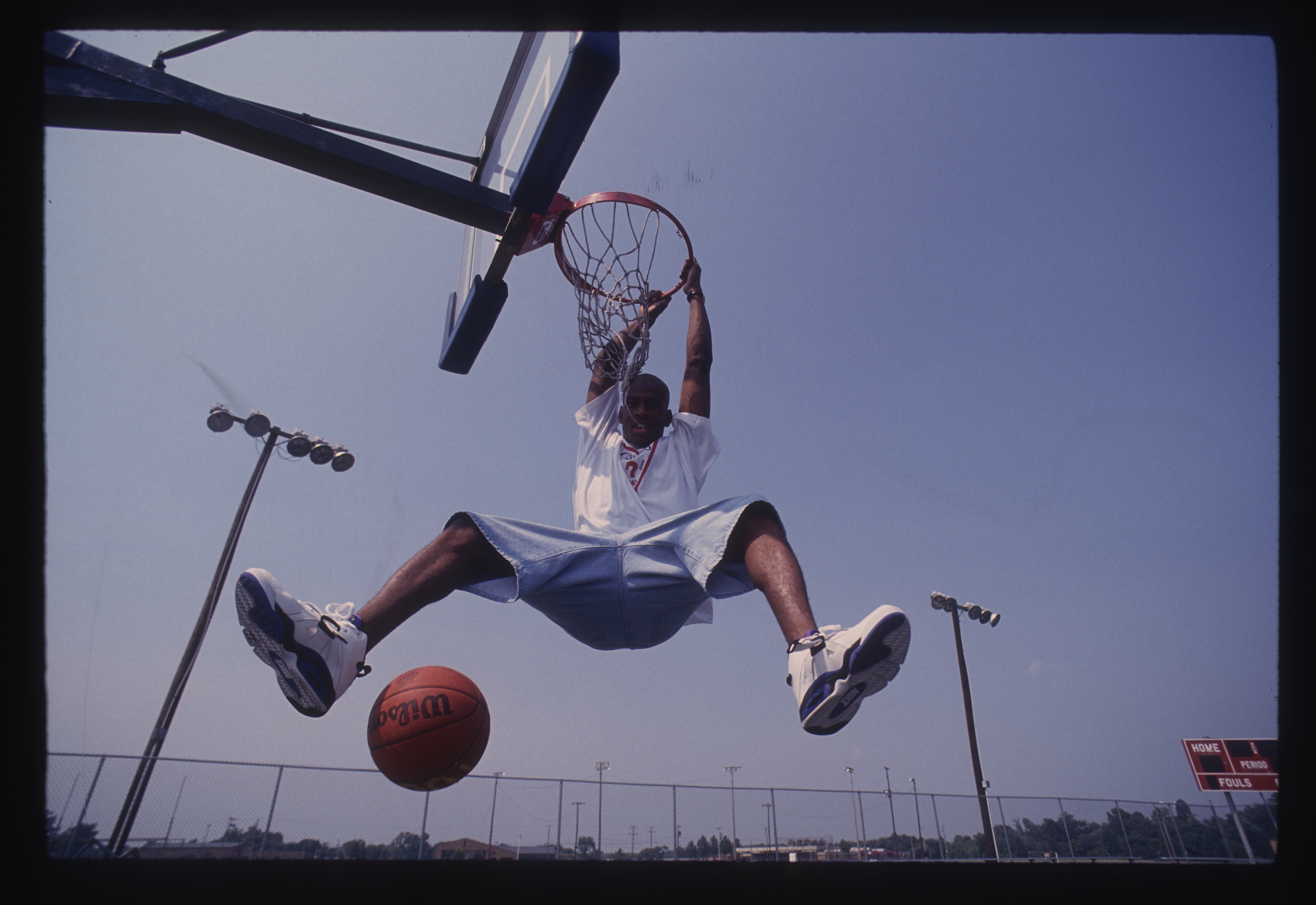 Allen Iverson wearing a Guess T-shirt in 1993.