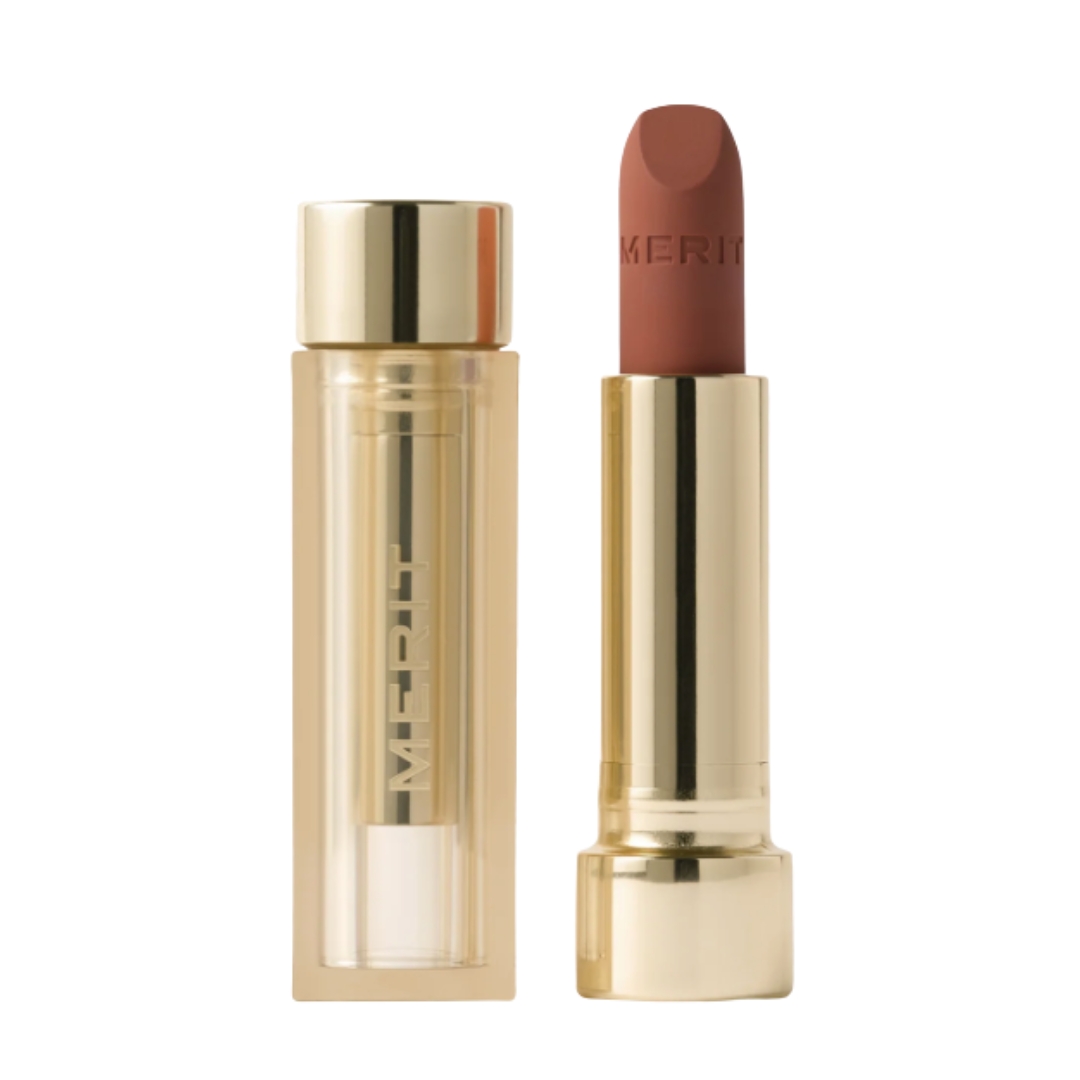 A product shot of the Merit signature lip blush lipstick, on a white background