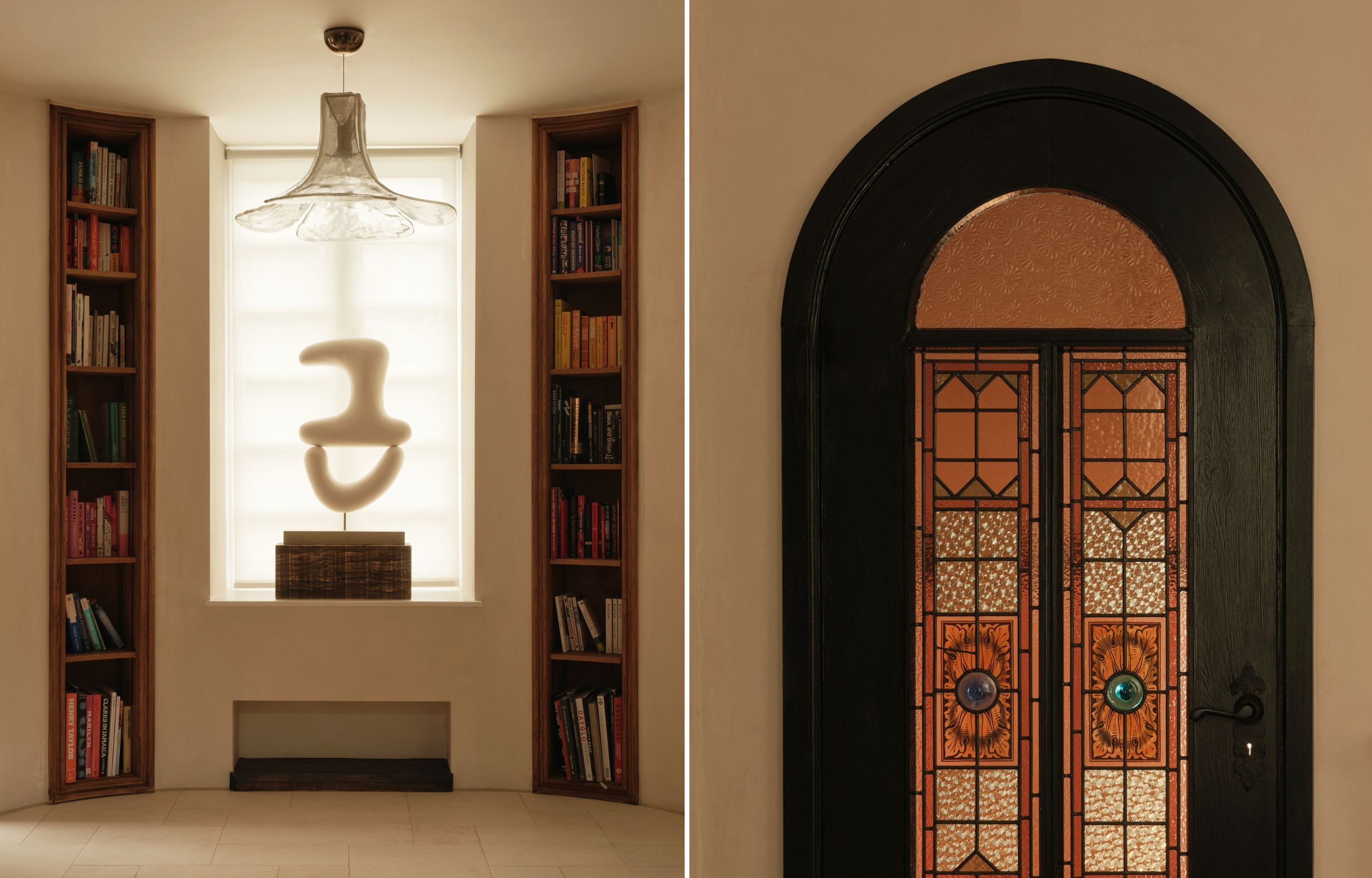 On the left is an area of the home with with book shelves and books on either side and in the middle is a large window with a sculpture places gracefully in the middle. In the image of the left is a period style door with stained glasswork in an arched shape.