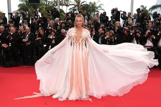 Lilly Krug attends the "Indiana Jones And The Dial Of Destiny" red carpet during the 76th annual Cannes film festival.