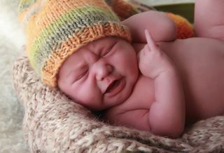 A crying newborn baby