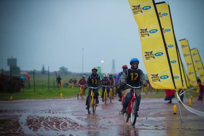 Kids braved foul weather for the Qhubeka street race
