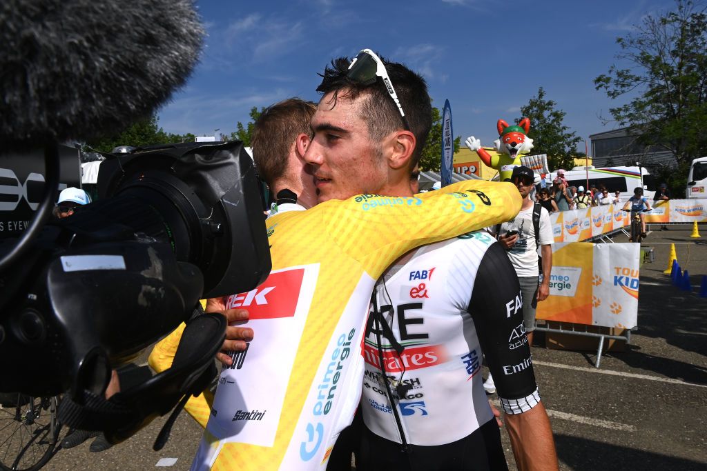 ABTWILL SWITZERLAND JUNE 18 LR Overall race winner Mattias Skjelmose Jensen of Denmark and Team TrekSegafredo Yellow Leader Jersey and stage winner Juan Ayuso of Spain and UAE Team Emirates react after the 86th Tour de Suisse 2023 Stage 8 a 257km individual time trial from St Gallen to Abtwil UCIWT on June 18 2023 in Abtwil Switzerland Photo by Tim de WaeleGetty Images