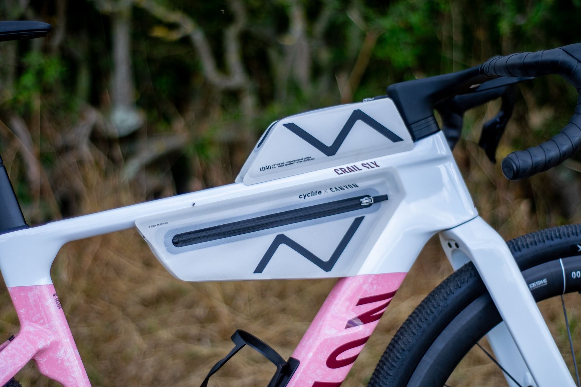 A Canyon Grail CF SLX 8 in the 'strawberry shake' colour 