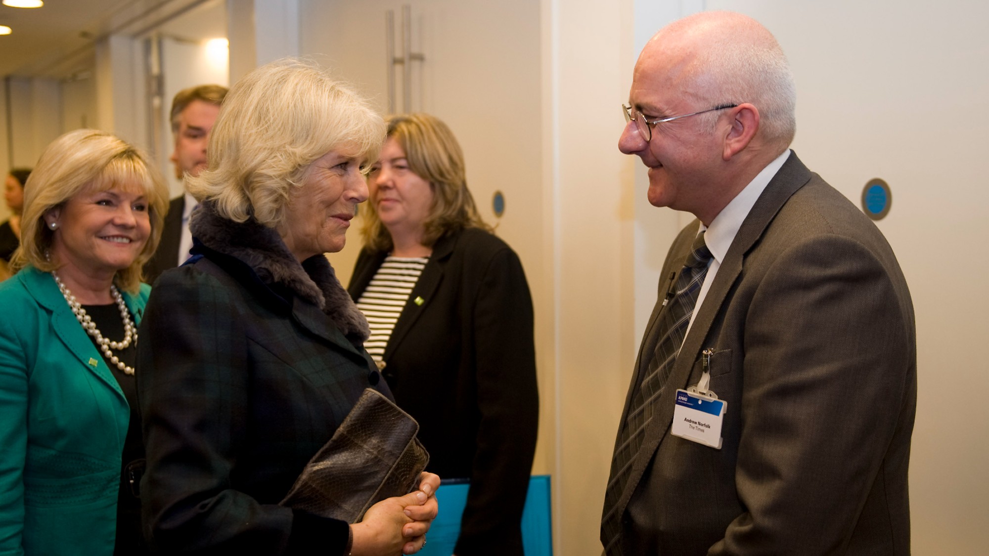 Andrew Norfolk speaks to Camilla, then-Duchess of Cornwall, at an anti-child exploitation event in London in 2011