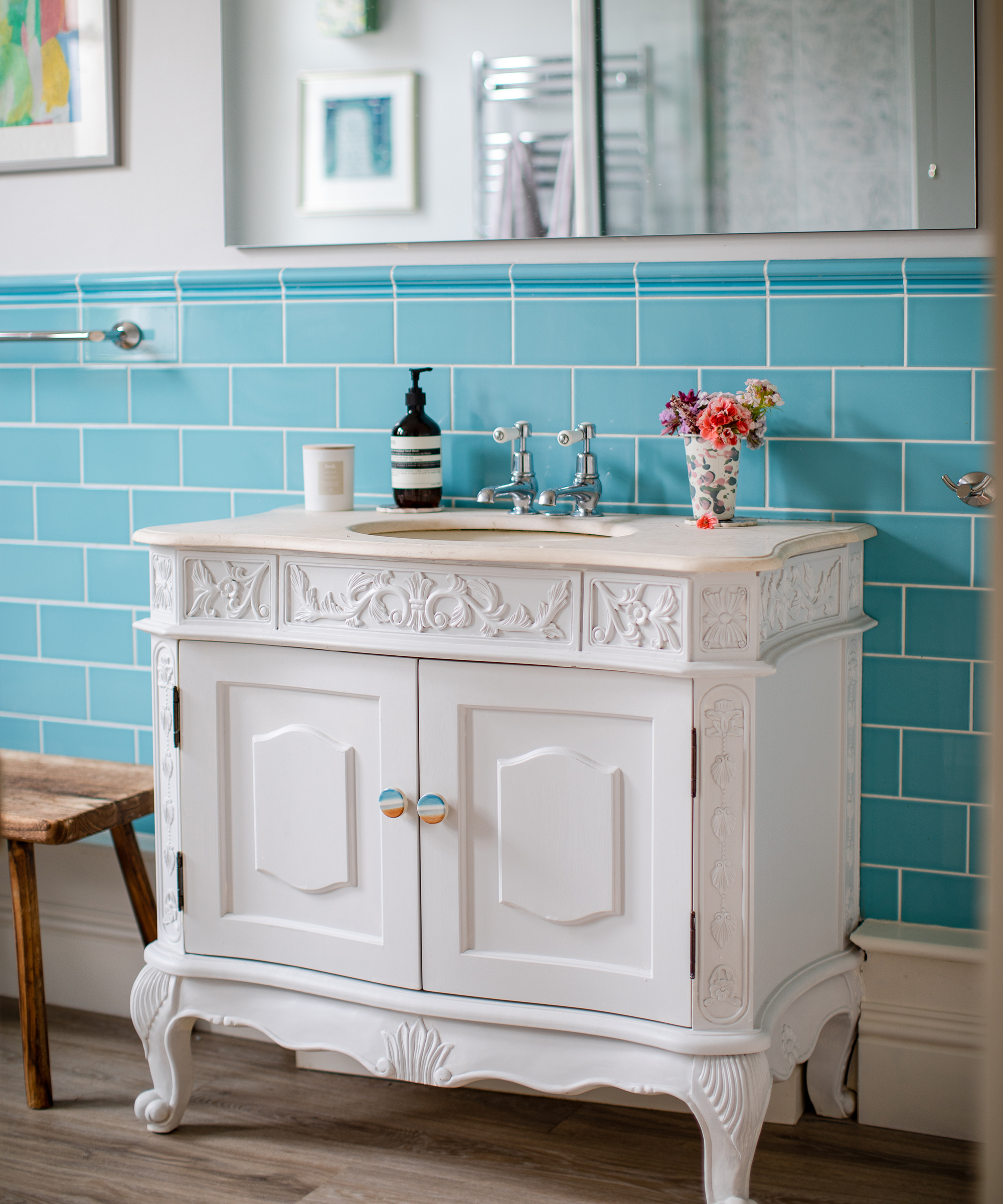 vintage bathroom vanity unit made from old cupboard with teal metro tiles