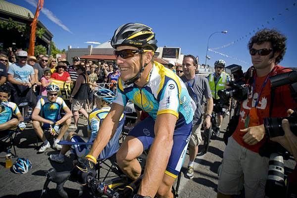 Armstrong signs autographs in Australia.