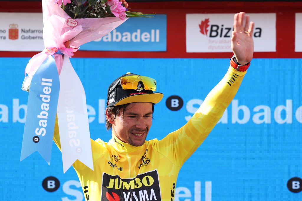 AMURRIO SPAIN APRIL 06 Primoz Roglic of Slovenia and Team Jumbo Visma celebrates winning the yellow leader jersey on the podium ceremony after the 61st Itzulia Basque Country 2022 Stage 3 a 1817km stage from Llodio to Amurrio itzulia WorldTour on April 06 2022 in Amurrio Spain Photo by Gonzalo Arroyo MorenoGetty Images