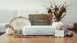 Amazon Prime Deals; a photo of a Cricut Explore Air 2 on a table