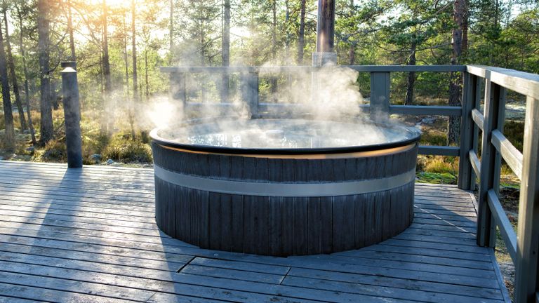 hot tub winter - large hot tub on raised wooden deck