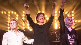 Triumph take a bow onstage