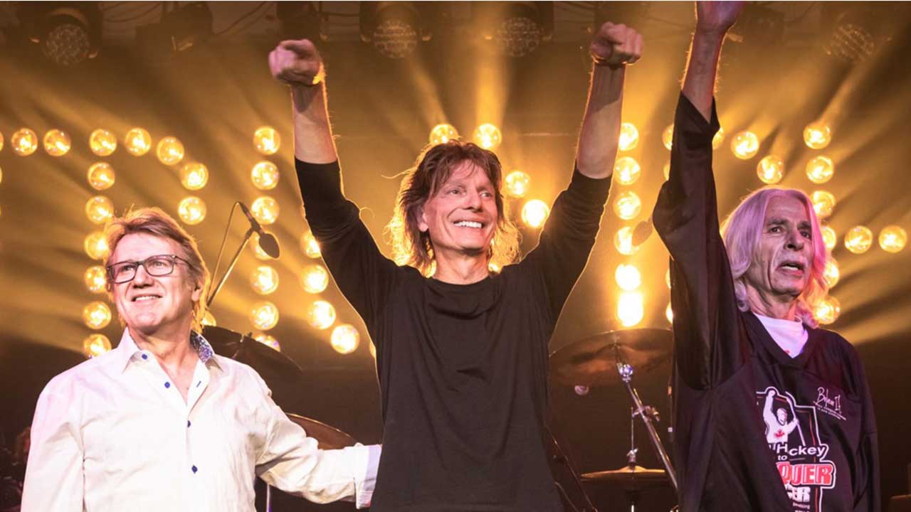 Triumph take a bow onstage