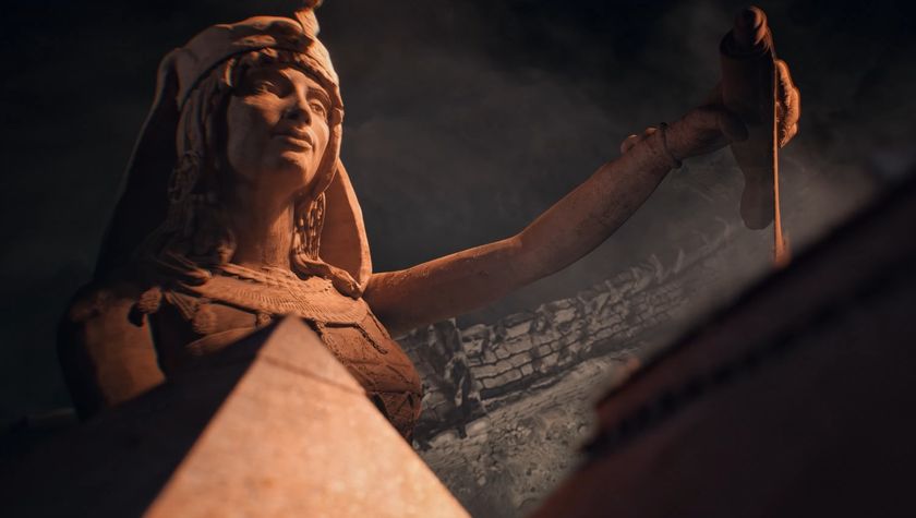 Statue pouring sand over a pyramid