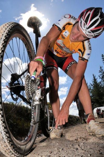 Max Knox takes time to lube his chain after some water crossings