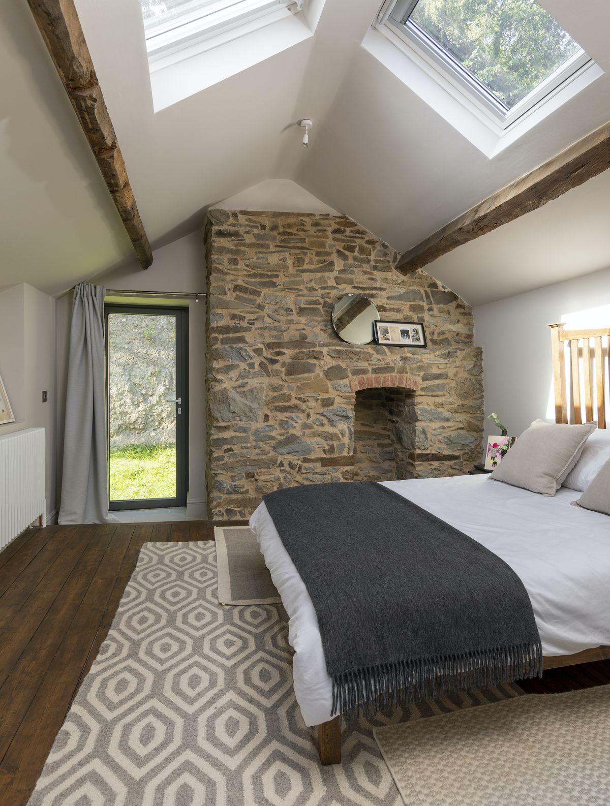 The floors in the bedrooms had also previously been covered in bitumen; the couple had to use an angle-grinder with a sanding pad to reveal the original timber floors underneath.