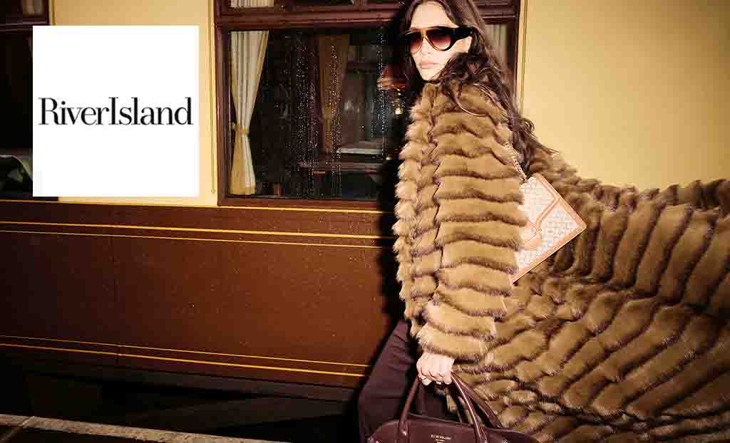 river island logo top left with a woman wearing big fur coat and big sunglasses