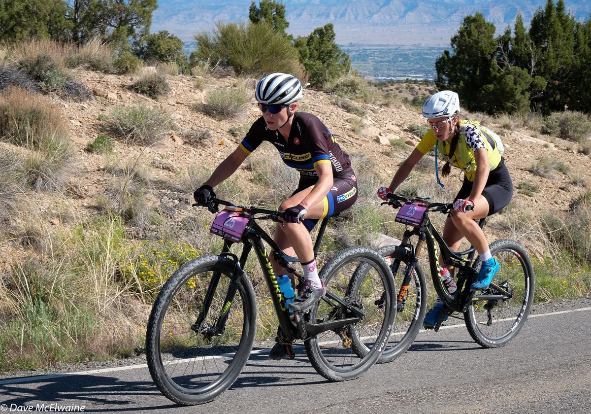 Amy Beisel (Pro Cycling) and Sofia Gomez Villafane (Assos) trying to chase down Katerina Nash