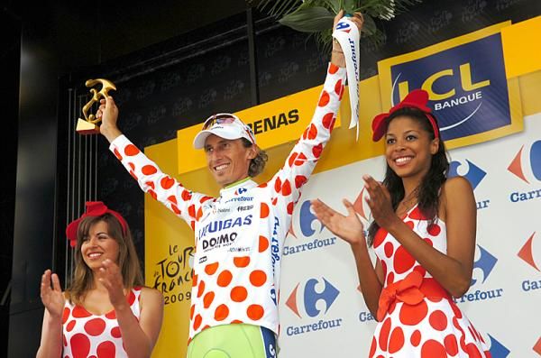 Franco Pellizotti (Liquigas) receives another polka dot jersey.