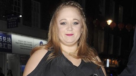 Amanda Henderson wearing a black dress on a night out 