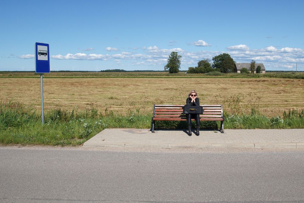 Girl waiting for a bus