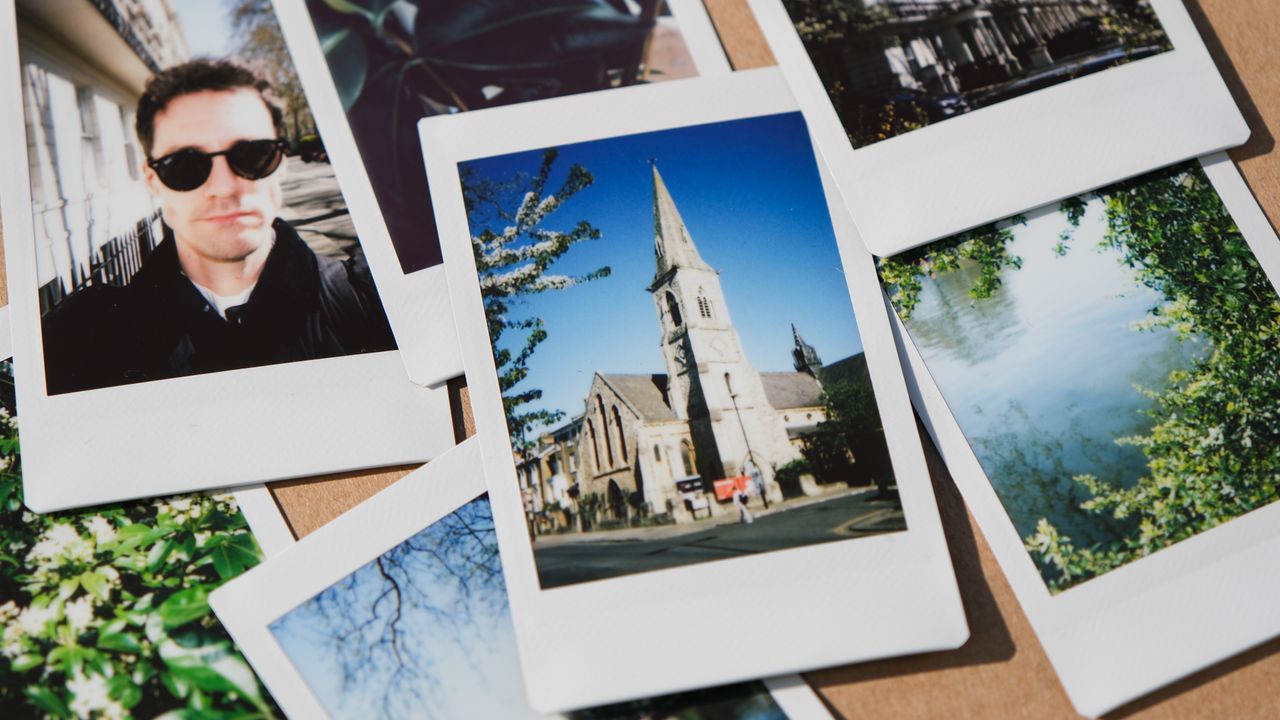 Fujifilm Instax Mini prints stacked on top of one another