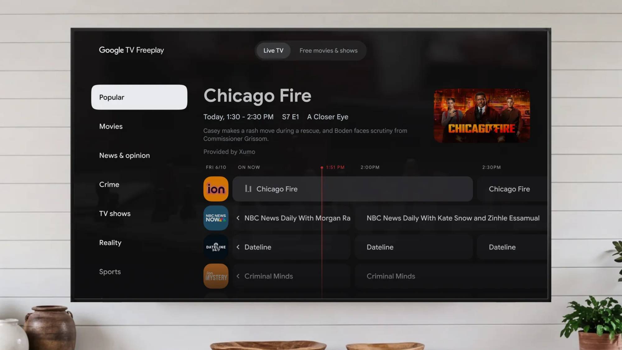 A Google TV with the Freeplay interface showing a live TV guide