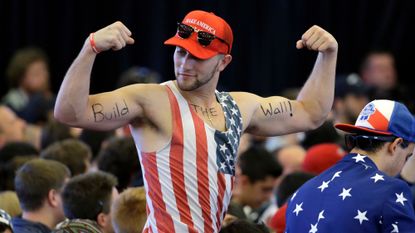 A man wearing a MAGA hat