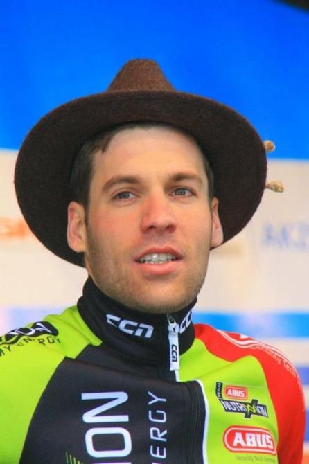 Grischa Janorschke (Nutrixxion Abus) about to collect his sprint classification winner's jersey