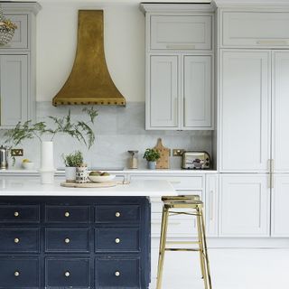 kitchen with cabinets and white worktop