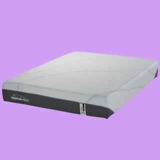 The Tempur-Pedic Adapt Mattress has a grey base and white breathable cover and is an excellent choice for people with joint pain