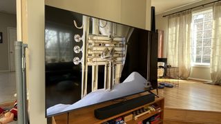 TCL QM6K showing image of trumpet on screen