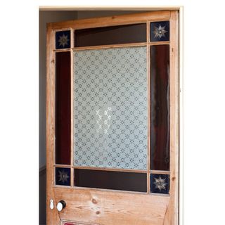 door with glass panel and glazing patterns