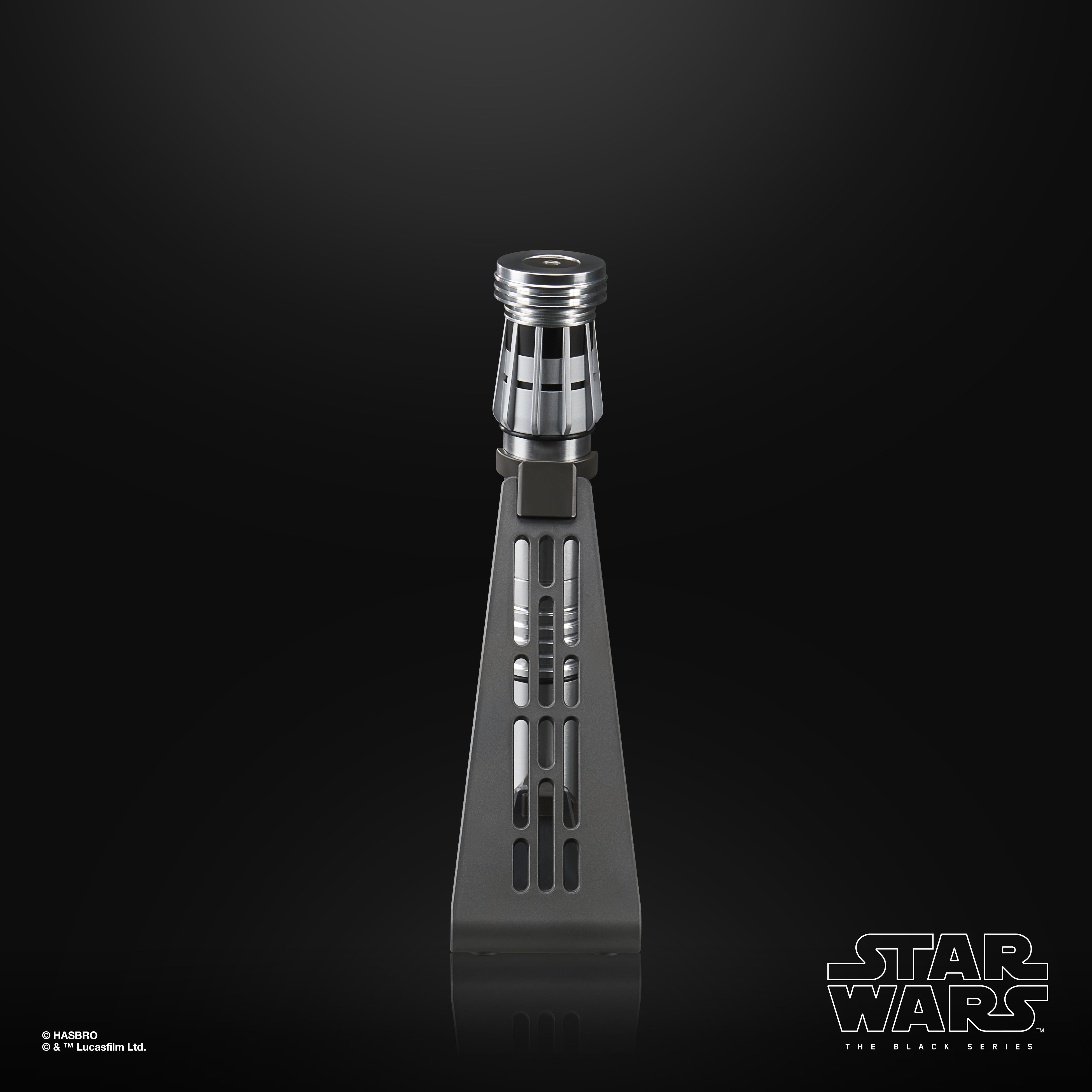 Star Wars The Black Series Force FX Elite Maul Lightsaber hilt and blade on a stand against a black background