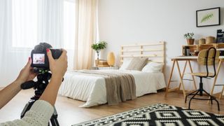 Taking a photo of a clean bedroom