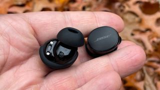 Bose QuietComfort Earbuds wireless earbuds held in hand