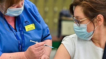 A woman receives her Covid vaccine in Edinburgh, Scotland