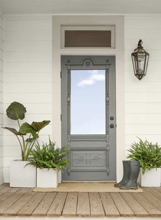 grey front door painted in benjamin Moore