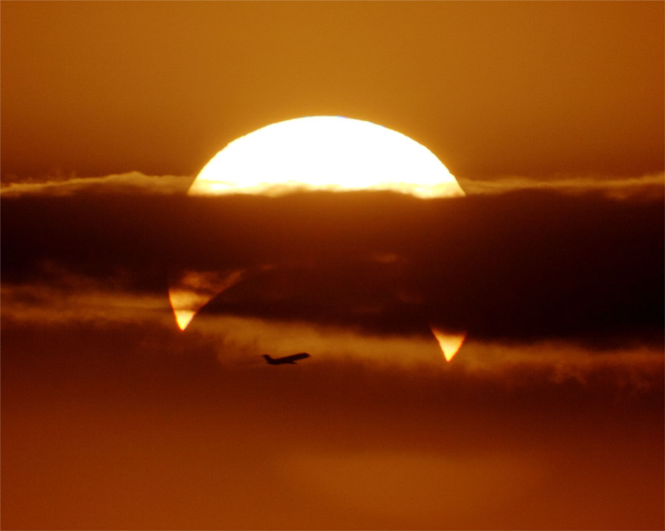 Airplane and Partial Solar Eclipse Calais 2013 May