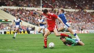 Ian Rush scores for Liverpool against Everton in the 1986 FA Cup final at Wembley.