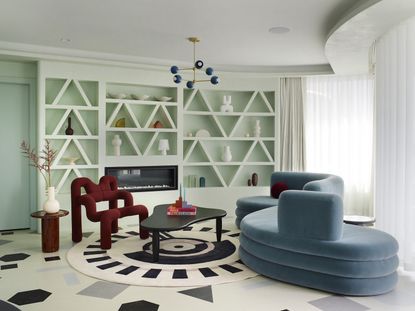 Bookshelves in triangular shapes painted light green