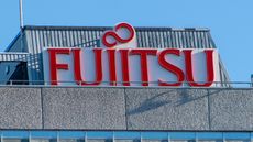 Fujitsu sign on top of building