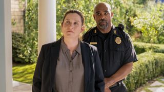 Donna Lynne Champlin as Nikki Henry, Michael Beach as Dan Carter in The Perfect Couple