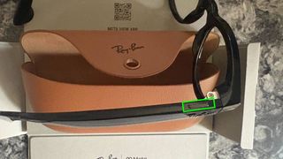 Ray-Ban Meta smart glasses with the power button highlighted 