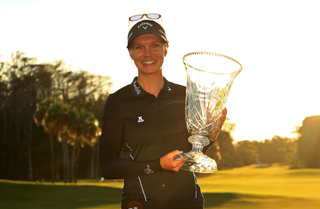 Madelene Sagstrom holds a trophy