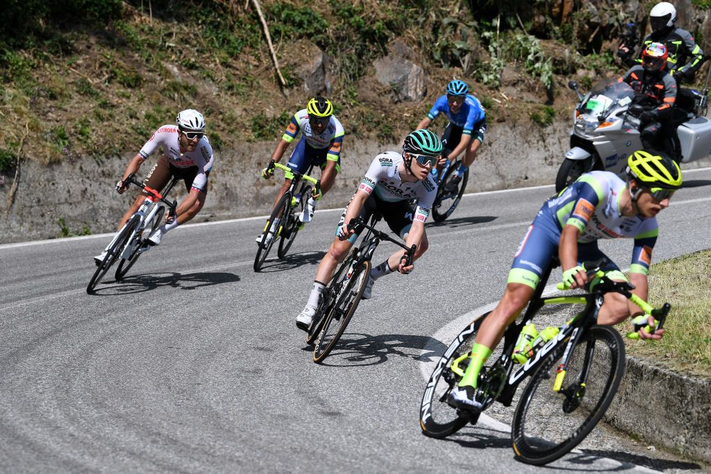 ALPE DI MERA VALSESIA ITALY MAY 28 Mark Christian of United Kingdom and EOLOKOMETA Cycling Team Larry Warbasse of United States and AG2R Citren Team Giovanni Aleotti of Italy and Team Bora Hansgrohe Quinten Hermans of Belgium and Team Intermarch Wanty Gobert Matriaux Andrea Pasqualon of Italy and Team Intermarch Wanty Gobert Matriaux in breakaway during the 104th Giro dItalia 2021 Stage 19 a 166km stage from Abbiategrasso to Alpe di Mera Valsesia 1531m Stage modified due to the tragic events on May the 23rd 2021 that involved the Mottarone Cableway UCIworldtour girodiitalia Giro on May 28 2021 in Alpe di Mera Valsesia Italy Photo by Tim de WaeleGetty Images