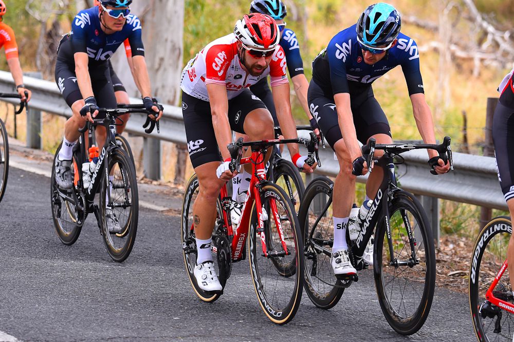 Thomas De Gendt and Wout Poels have a chat during stage 2 at the Tour Down Under