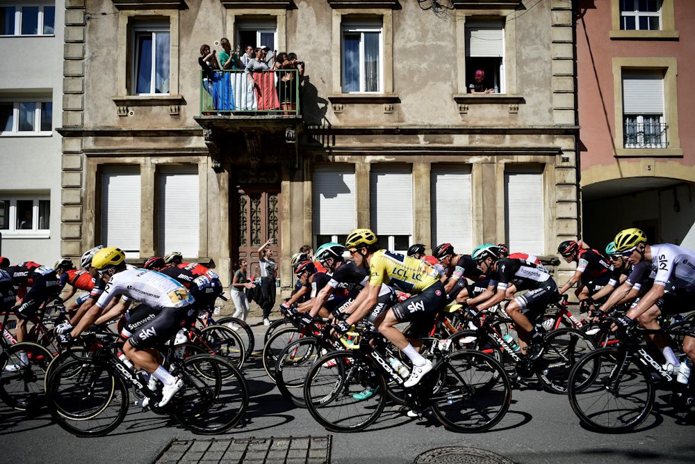 Yellow jersey wearer Geraint Thomas in the peloton
